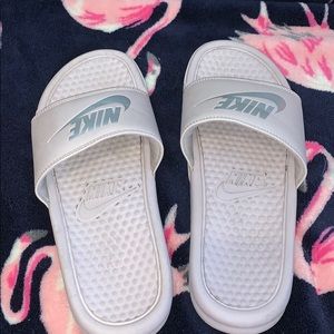 Nike Shoes - Pink nike slides with silver decal Nike Shoes - Pink nike slides with silver decal